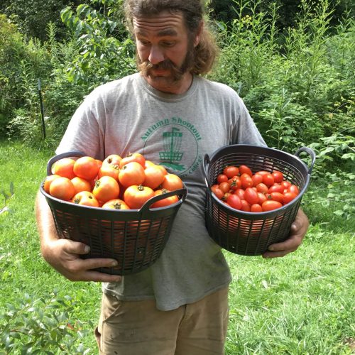 Dustin of Sustainabillies with tomatoes